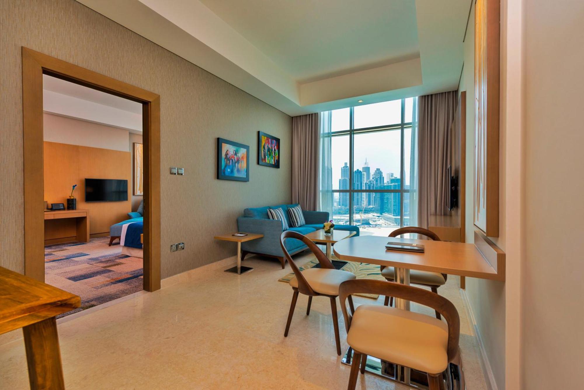 One Bedroom Suite - Dubai Canal view with free access to Hotel's private beach at Palm-Jumeirah
