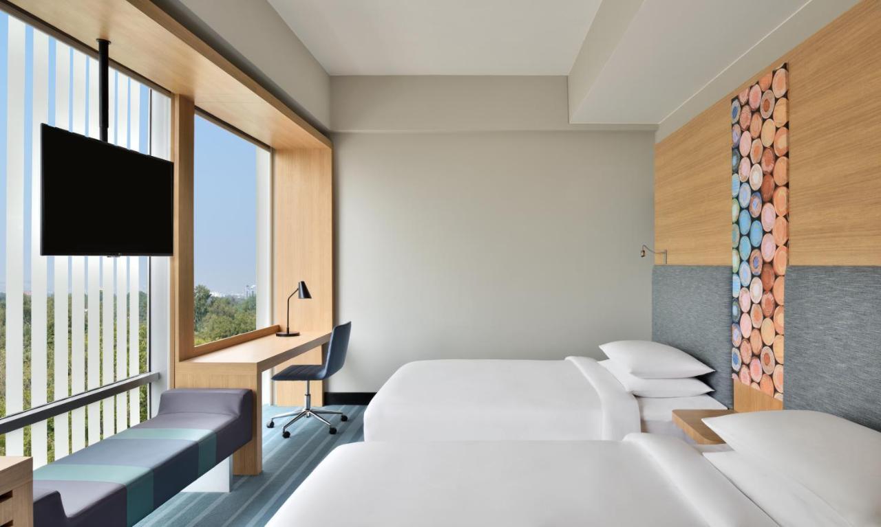 Aloft Twin Room, High Floor - 3rd and above:  20% discount on F&B and SPA
