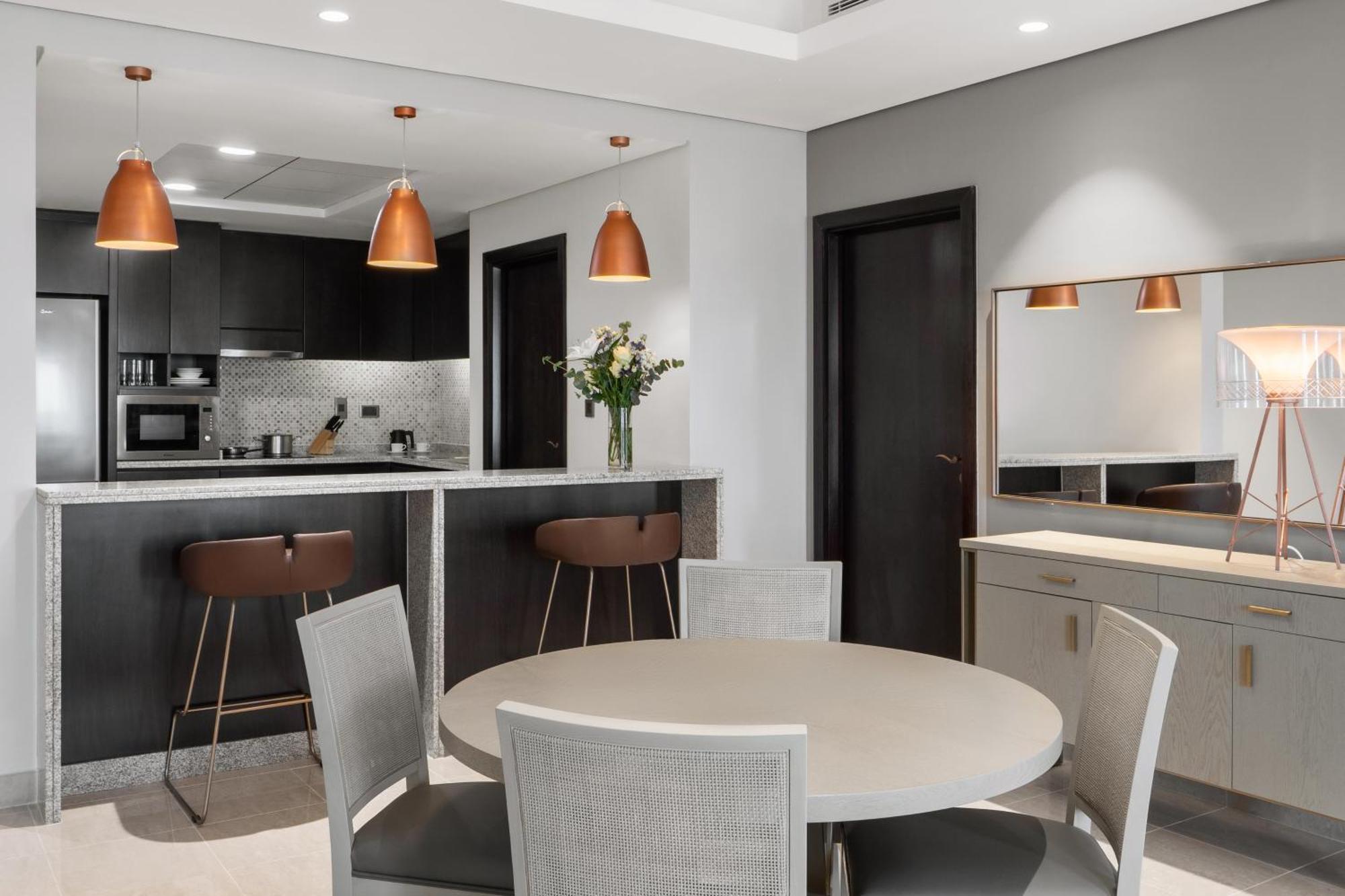 One-Bedroom Apartment with Skyline View and Private Beach Access