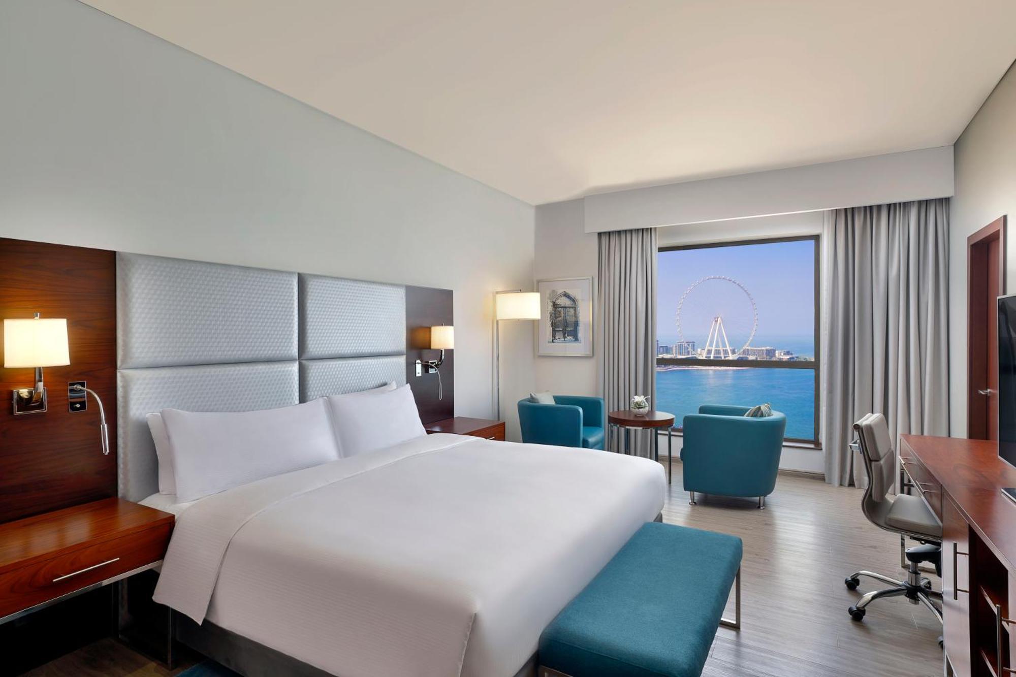 Three-Bedroom Family Suite with Balcony and Sea View
