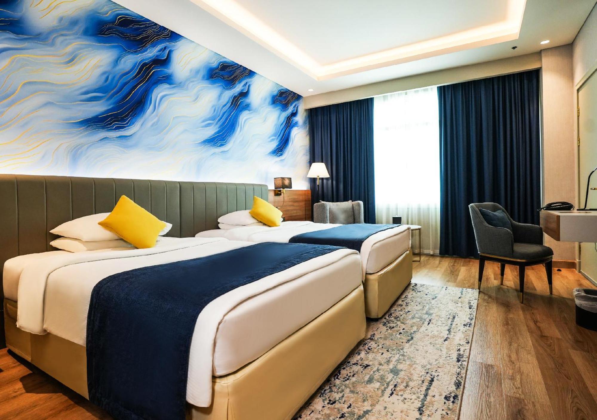 Deluxe Room Twin Beds
