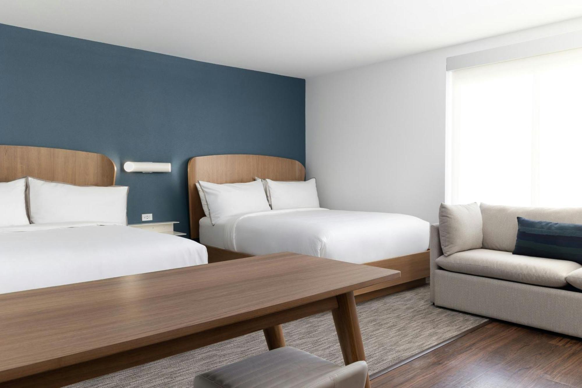 Studio with Two Queens and One Sofa Bed - Bathtub