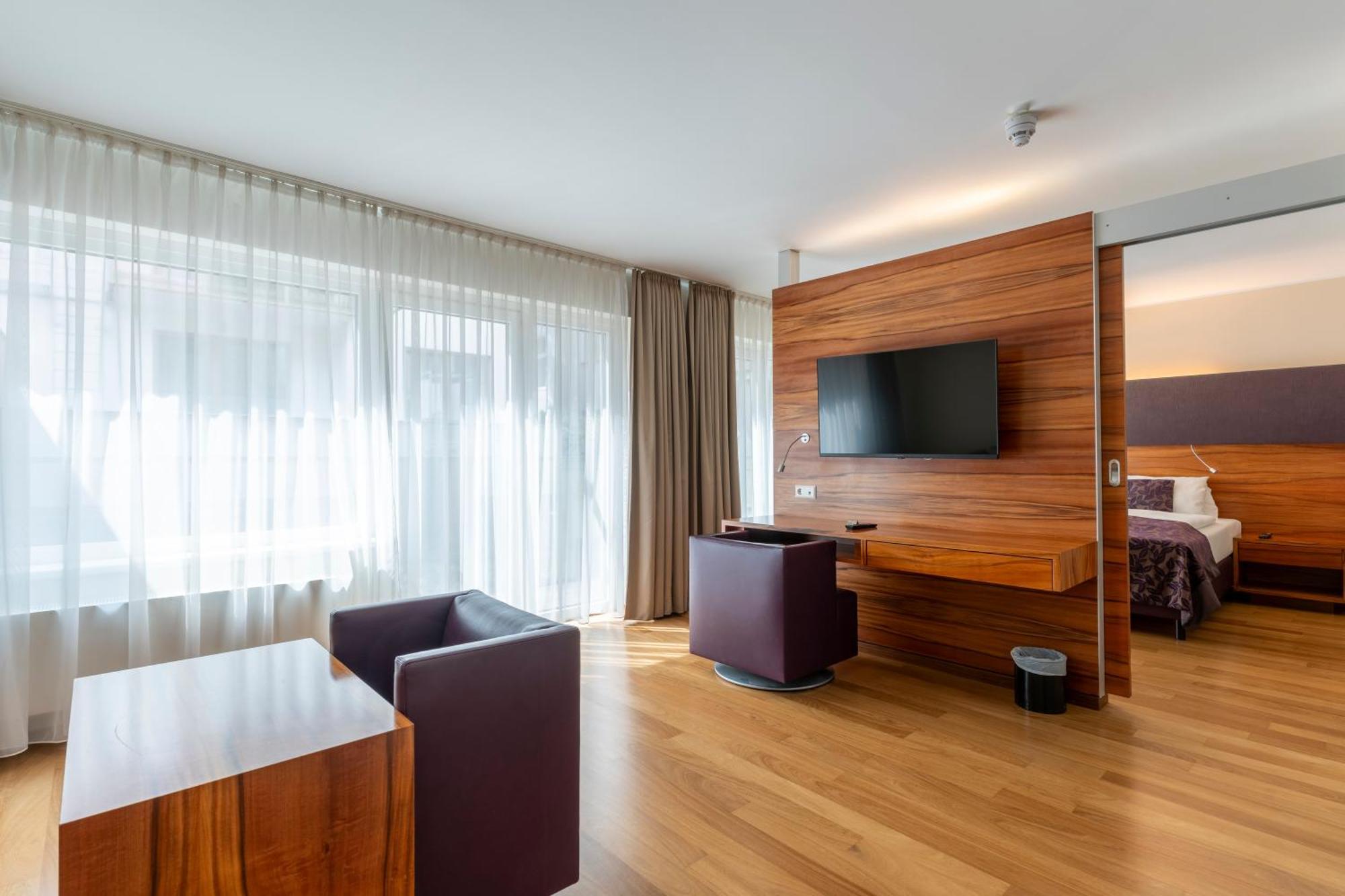 One-Bedroom Apartment with Balcony - 110, 112