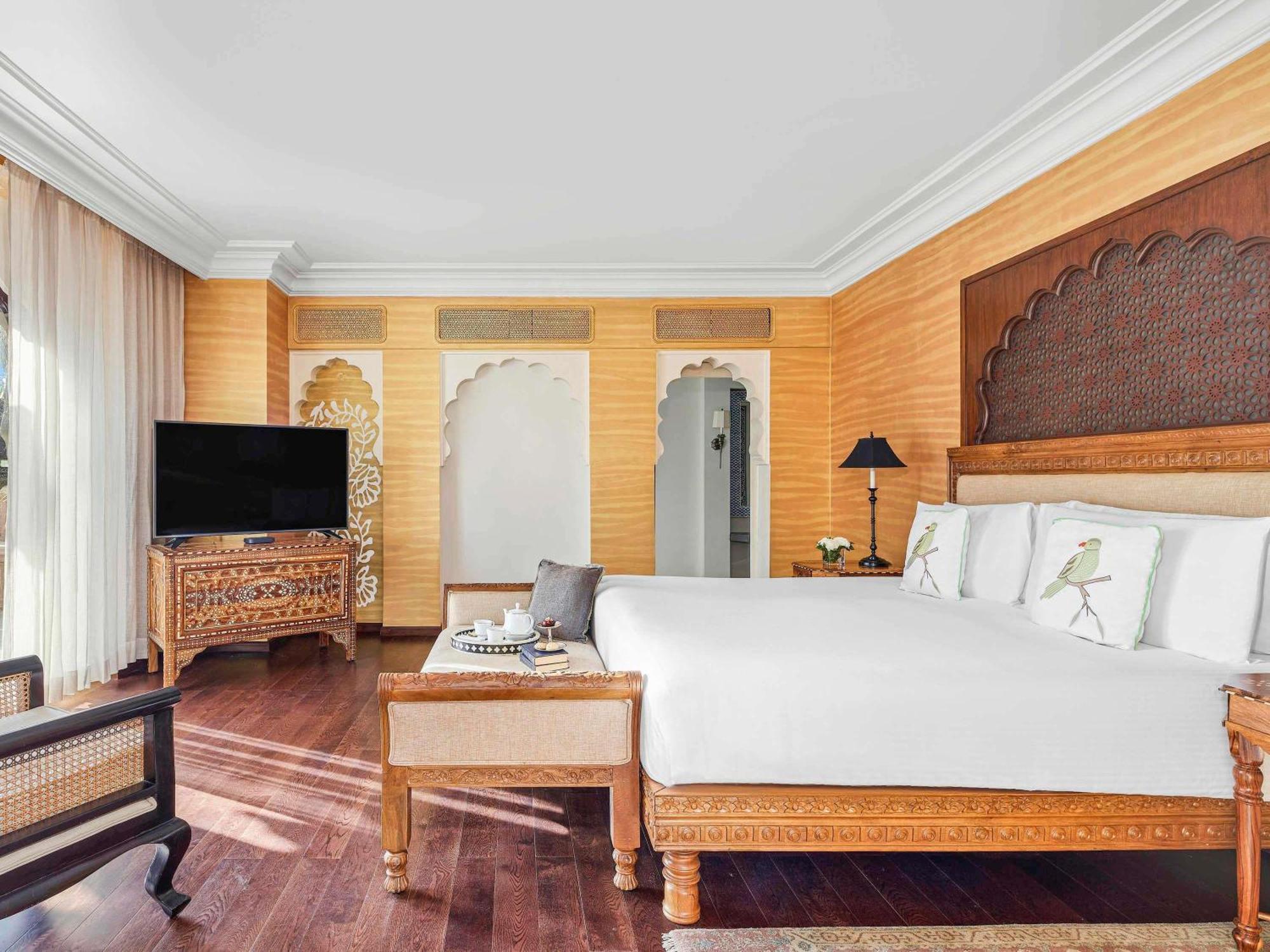 Terrace Suite 2 complimentary craft beers or signature cocktail at Anjum per room per Happy Hours Buy 1 1 at Anjum Bar on Select beverages on Food & Soft Beverage Laundry Set couple at ZarinINR 5000