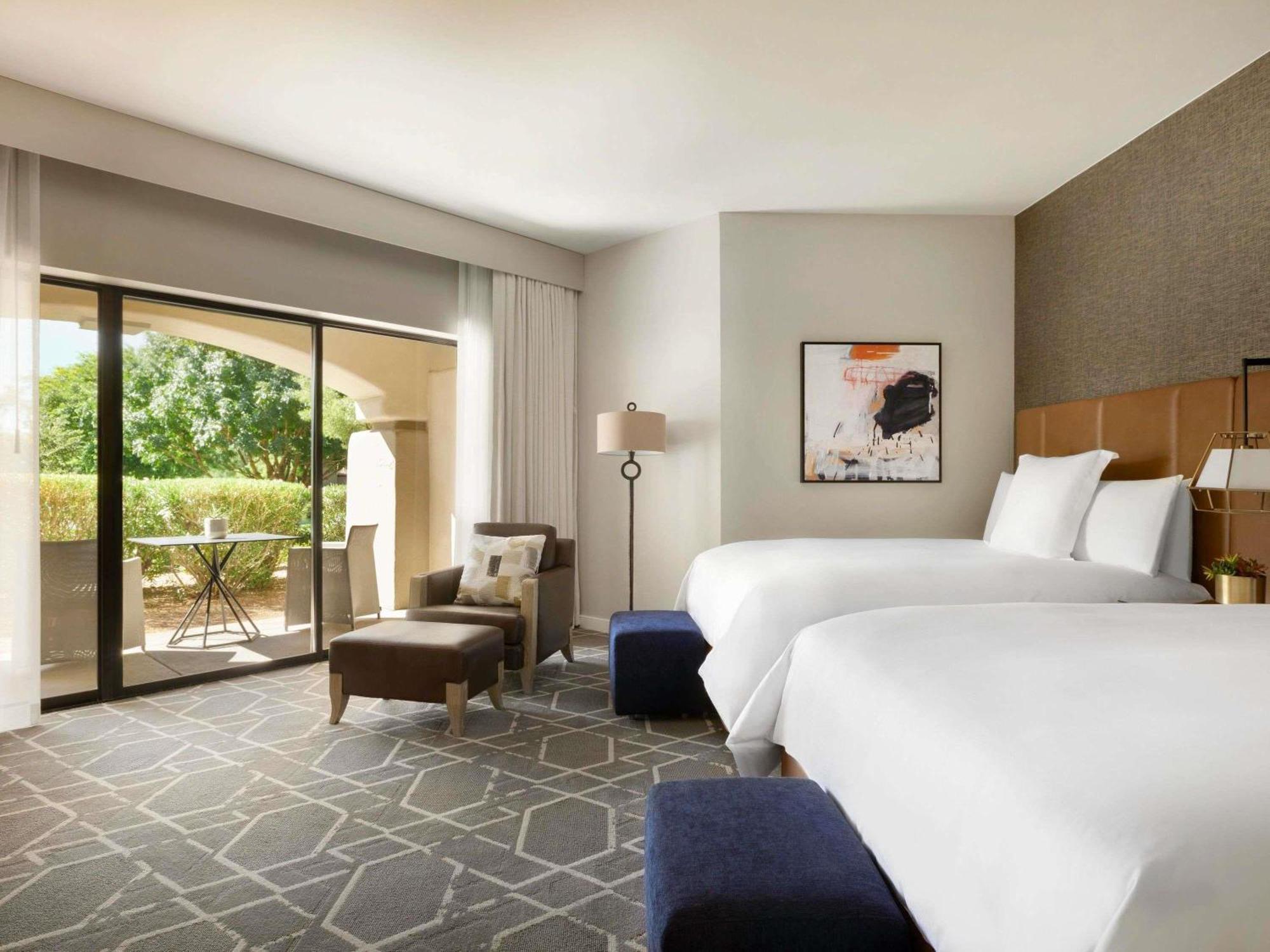 Deluxe Queen Room with Two Queen Beds and Patio or Balcony - Pool View
